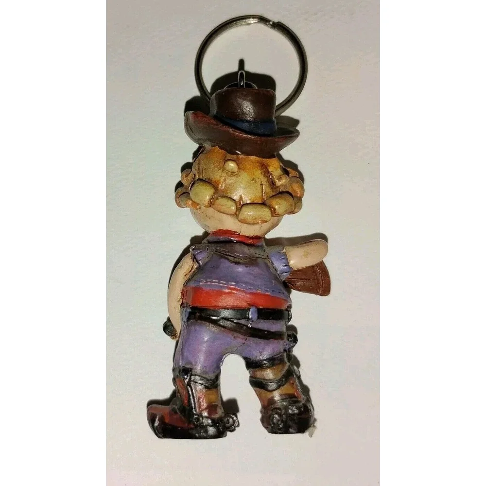 Crazy‎ Crosseyed Cowboy Keychain Figure Possible Vintage Carrying Shotgun Scar